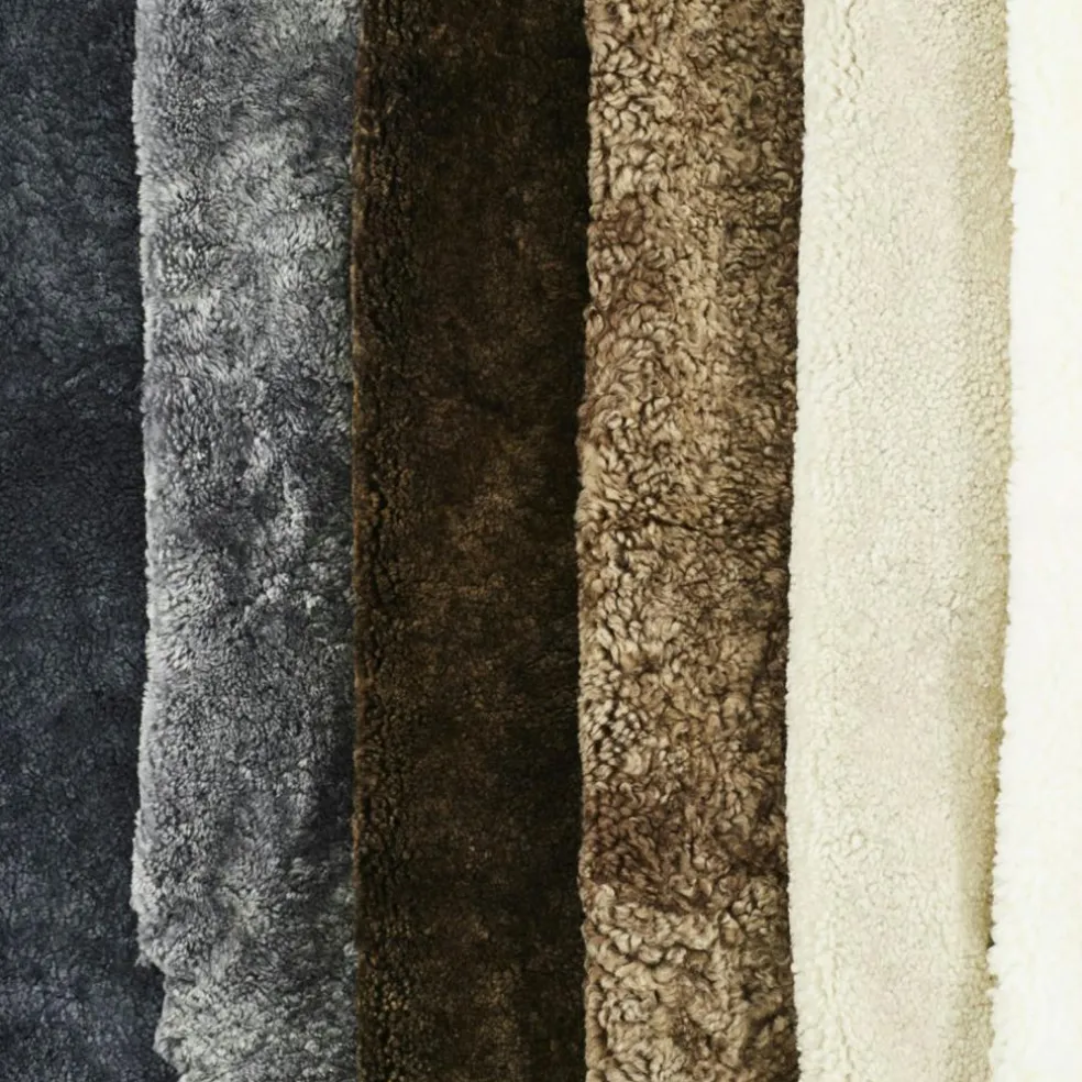 Lamino Armchair With Footstool Sheepskin, Black / Lacquered Beech